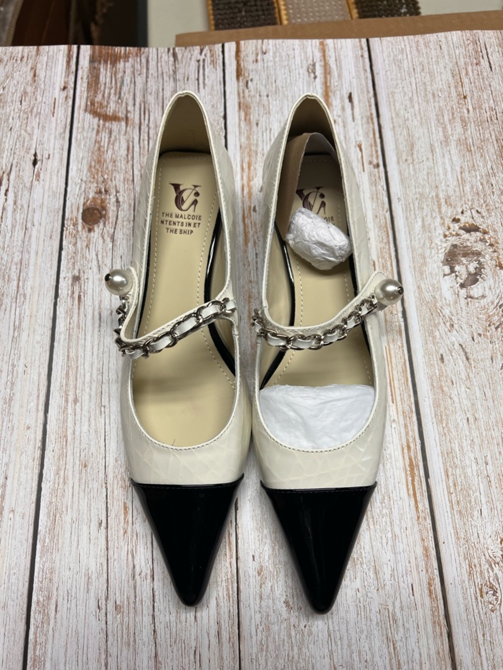Ivory and Black Chain Mary Jane Pumps